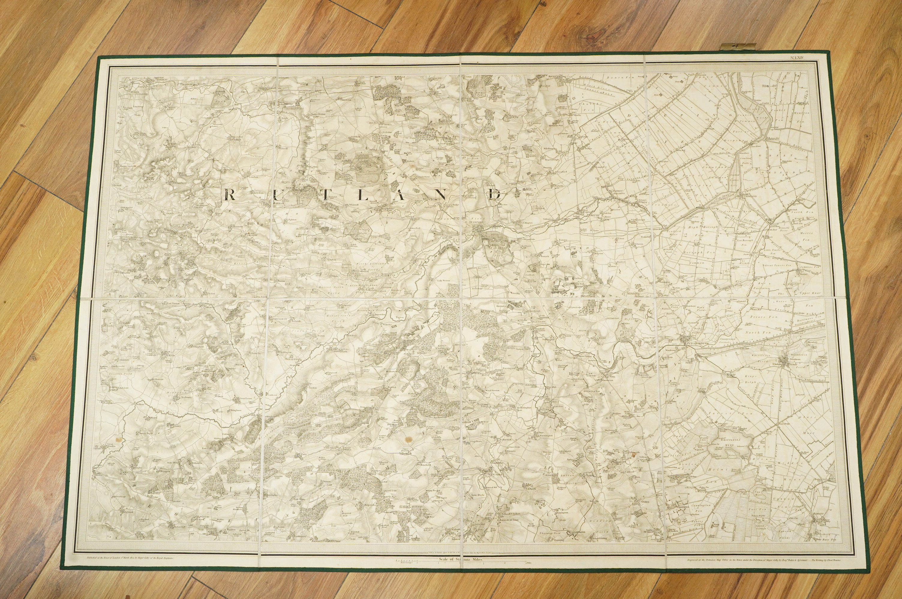 Ordnance Survey maps of Lincolnshire, Rutlandshire, N. Huntingdonshire and W. Norfolk &c., comprising of a set of eight engraved maps mounted on linen and edged in green cotton, including sheet no.s; 64, 65, 69, 70, 83,